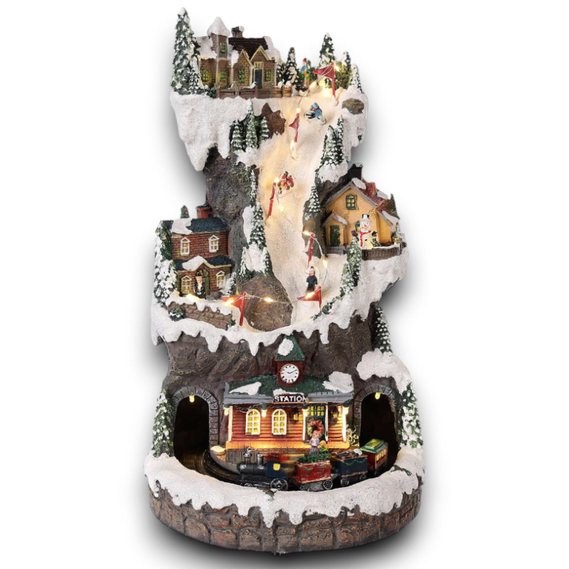 Villaggio Natalizio Innevato con Trenino e Pista Sciatori Illuminato - Decorazione 3D Natalizia 21x21x37cm