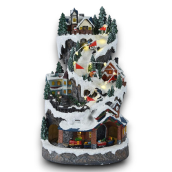 Villaggio Natalizio Innevato con Trenino e Pista Sciatori Illuminato - Decorazione 3D Natalizia 21x21x37cm